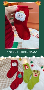 Detail of Christmas cotton socks with 3D plush Santa and reindeer mascot decorations