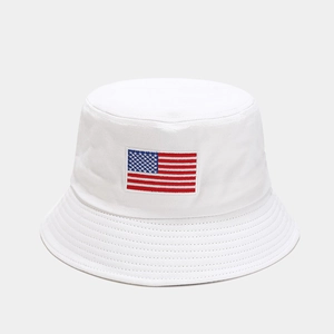 Detail of American flag embroidery on white cotton sun bucket hat with high-quality stitching