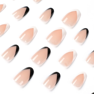 Glossy long almond press-on nails with black and white V-shape French design tips