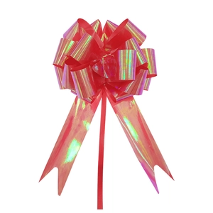 Detail of red holographic gift pull bow with shiny laser effect for present wrapping