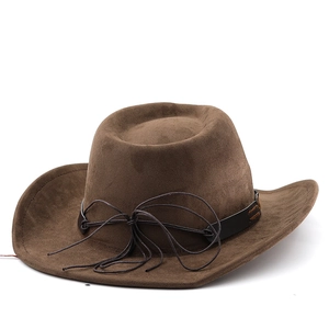 Detail of dark brown faux suede cowboy hat with classic leather band and decorative cord