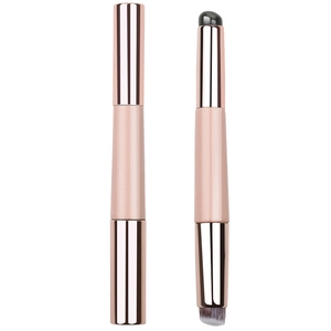 Dual-ended silicone lip and concealer brush set with pink handle and rose gold caps