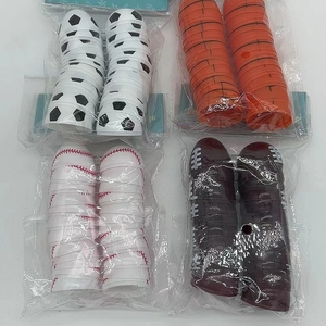 Detail view of assorted sports themed party favors with football and basketball motifs