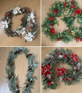 Detail showing four styles of Christmas garlands with red berries, pinecones and flowers