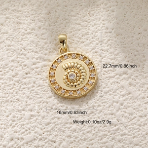 Detail of 14k gold plated shell pendant with dimensions and stones on beige background