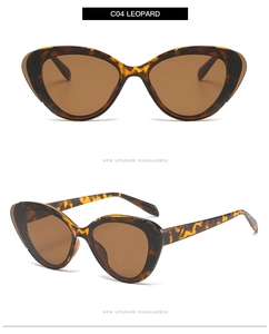 Detail view of leopard print cat eye sunglasses with brown lenses and polished frames
