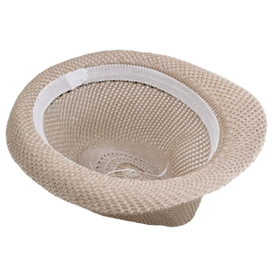 Detailed interior of a beige knitted sun hat showing white sweatband and airy weave