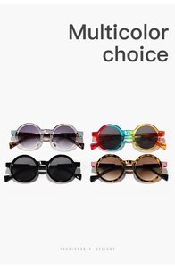 Flat lay of four pairs of vintage round frame sunglasses in multiple trendy colors
