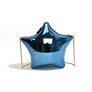 Star-shaped crossbody bag in mirror-finished blue with a golden chain strap