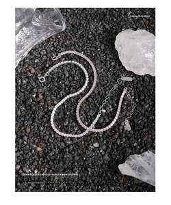 Macro shot of S925 sterling silver tennis bracelets with pink and white cubic zirconia