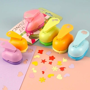Colorful craft paper punches for kids DIY projects featuring various floral patterns