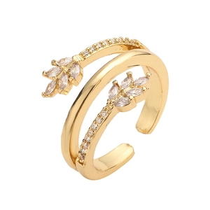 Golden double-layer cross ring with leaf design and sparkling cubic zirconia stones