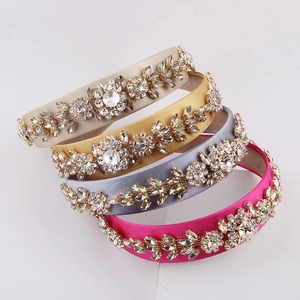 Detail of baroque headbands with multi-color rhinestones in champagne and gold tones