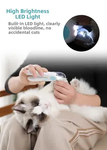 Détail macro de la lumière LED éclairant la ligne de sang des griffes de chat