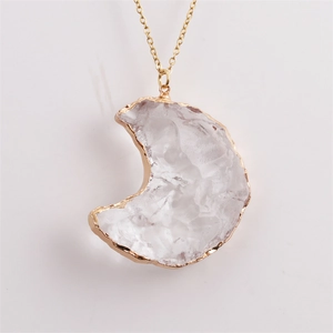 Faceted quartz moon pendant necklace with gold plated edges on a twisted metal chain