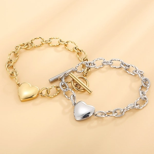 Bracelet pendentif cœur doré et argenté avec chaîne épaisse et fermoir à bascule