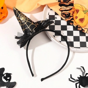 Detail of black mini witch hat headband with gold spider web pattern and lace trim