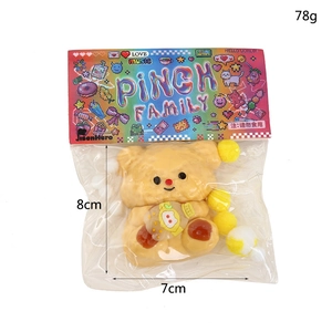 Cute yellow bear squishy stress relief toy in packaging with 8cm height measurement
