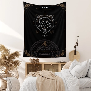 Detailed close-up of Leo zodiac tapestry on a cozy minimalist bedroom wall