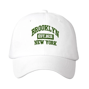 White cotton baseball cap featuring green Brooklyn New York vintage embroidery