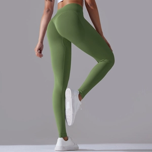 Detail view of seamless olive green yoga leggings showing scrunch butt lift and high waist
