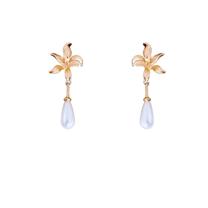 Elegant gold-plated flower earrings with white teardrop pearls on a clean white background