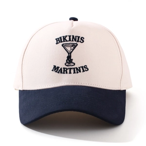 Front view of a two-tone baseball cap with embroidered lettering and martini glass icon