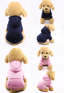 Detail of pet hoodie with functional pocket and ribbed cuffs in blue and pink colors