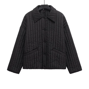 Fashionable black quilted long sleeve lapel jacket with button closure and side pockets
