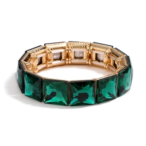 Luxurious gold-tone stretch bracelet with geometric emerald green square crystals