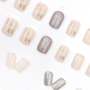 Short sparkling snowflake press-on nails set with gold patterns and silver glitter finish