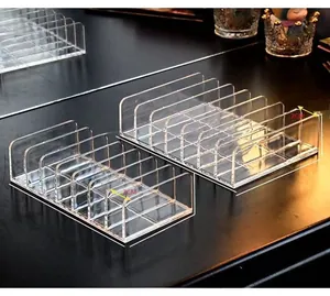 Detail of transparent acrylic eyeshadow palette organizer with 2cm compartment dividers