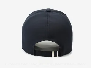 Detail view of the dark baseball cap back with adjustable metal buckle and strap