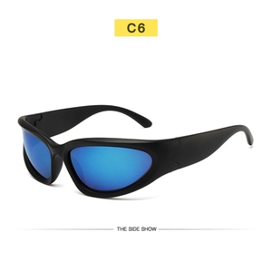 Detail of matte black cycling sunglasses with blue reflective mirrored lenses in Y2K style