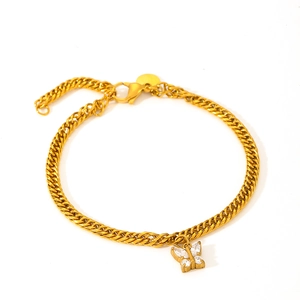Golden stainless steel butterfly charm bracelet with sparkling zircons on white background