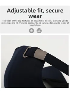 Detail of adjustable metal buckle and fabric strap on the navy baseball cap back
