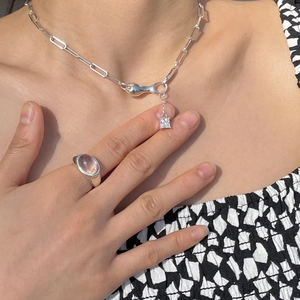Elegant 925 sterling silver chain necklace with zircon and pink gemstone ring on model