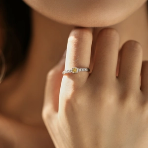Elegant S925 sterling silver ring with a square yellow gemstone and side diamonds