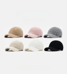 Flat lay of knit baseball caps in six colors showing soft faux fur texture for winter