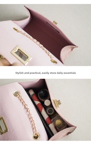 Pink crocodile pattern bag showing interior capacity with cosmetics and gold chain strap