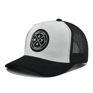Detail view of trucker hat with Enjoy Life round patch and breathable mesh back