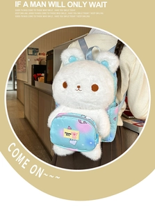 Detail of white plush bunny backpack with a gradient small pouch and soft texture