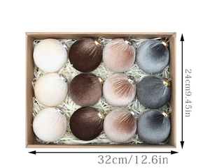 Detailed view of 12 velvet Christmas balls in a storage box with size measurements