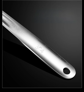 Macro detail of the polished SUS 304 stainless steel handle with convenient hanging hole