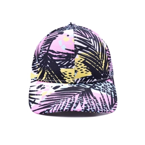 Detailed view of vibrant tropical palm leaf print and stitching on a six-panel baseball cap