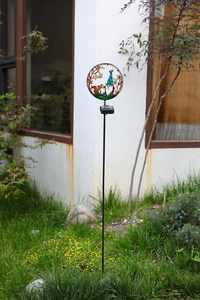 Solar iron garden stake light with bronze dwarf and squirrel silhouette cutout design