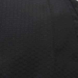 Close-up of black breathable honeycomb ripstop fabric for outdoor quick-dry sun hat