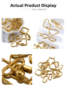 Macro shot of gold plated stainless steel connectors in heart and star shapes