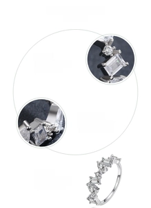 Close-up of S925 sterling silver ring featuring zircon stones in various shapes and prong setting