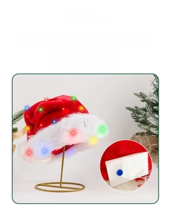 Detail view of the LED Christmas hat interior showing the battery box and colorful bulbs